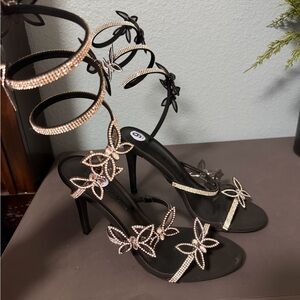 Black butterfly heels. New never worn